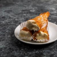 Cheese Cone · Inspired by cannoli, this is a hand-rolled almond cone filled with our specialty creamy chee...
