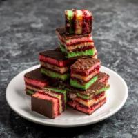 Rainbow Cookies · One pound of baby john's famous rainbow cookies. Almond cake layers with raspberry filling c...