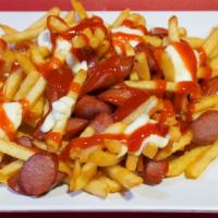 Salchipapas · French fries with hot dogs