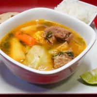 Sopa De Res (Beef Soup) · Sopa de res servida con arroz y dos tortillas (Beef soup served with rice and 2 tortillas).