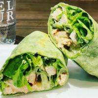 Grilled Chicken Caesar Wrap · Romaine lettuce, Parmesan cheese, our famous Caesar dressing.