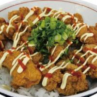 Kara-Age Rice Bowl · Japanese fried chicken topped with BBQ sauce, sriracha, and mayo, scallion