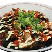 Kakuni Rice Bowl · slow braised pork belly topped with BBQ sauce,sriracha ,and mayo scallion