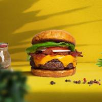 Breakin' Bacon Vegan Burger  · Seasoned plant-based patty topped with melted vegan cheese, layers of crispy vegan bacon, le...