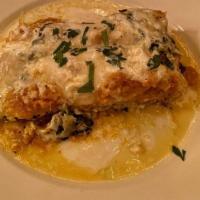 Vegetable Lasagna · Pasta layered with spinach, tomato sauce, ricotta, and béchamel.