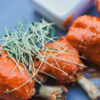 Lollipop Wings · French Cut Chicken Wings with Housemade Spicy Buffalo Sauce.