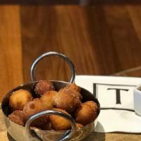 Zeppoles · Delicate ricotta doughnuts covered with cinnamon-sugar, served with our own sea salt caramel...