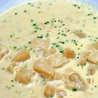 New England Clam Chowder · Minced Quahog clams, simmered with onions, potatoes, double-smoked bacon, clam broth, cream..