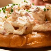 Lobster Roll · Chunks of Maine lobster, dressed with mayo and lemon in a butter toasted bun. Shoestring fri...