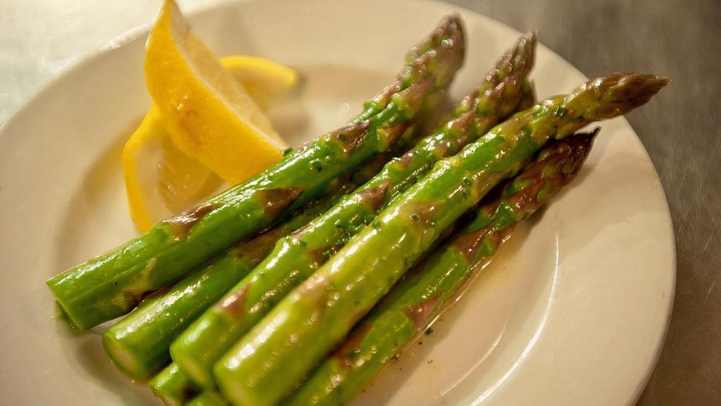 Asparagus · Light butter sauce, lemon.
