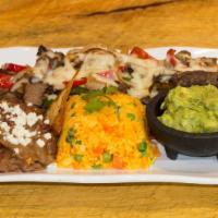 Alambre · Grilled beef with peppers & onions served with beans, guacamole , yellow rice and chips