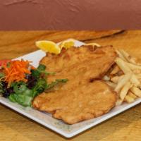 Empanizado · Seasoned breaded chicken served with salad rice and beans