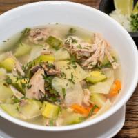 Sopa De Pollo · Chicken soup with vegetables.