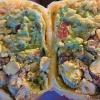 Fiesta Burrito · Chicken, beef, chorizo, topped with mole poblano and green sauce.