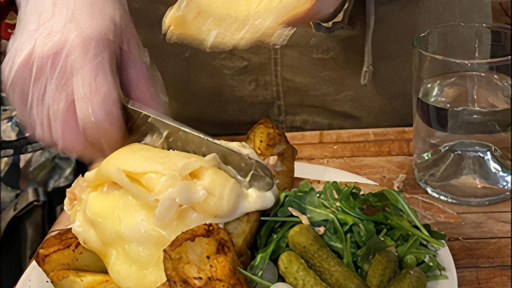 Raclette Suisse · Roasted new potatoes, cornichons, pickled white pearl onions with a choice of charcuterie