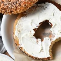 Whole Wheat Bagel With Cream Cheese · Fresh homemade whole wheat bagel smothered with cream cheese.