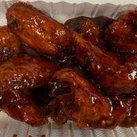 H 2. General Tos'S Wings  · Hot and spicy. 8 Pieces.