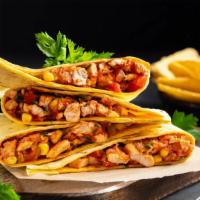 Chicken Quesadilla · Hearty, quesadilla with tender grilled chicken, grilled peppers, onions, melty cheddar and j...