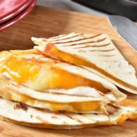 Four Cheese Quesadilla · Simple, classic and satisfying quesadilla with a generous blend of pepper jack, Swiss, fresh...