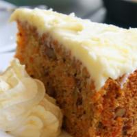 Carrot Cake Slice · Moist, perfectly spiced carrot cake with a rich, cream cheese frosting.