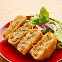 Potato Croquette · 2 pieces of fried croquette with mashed potato and minced beef, served with original Tonkats...