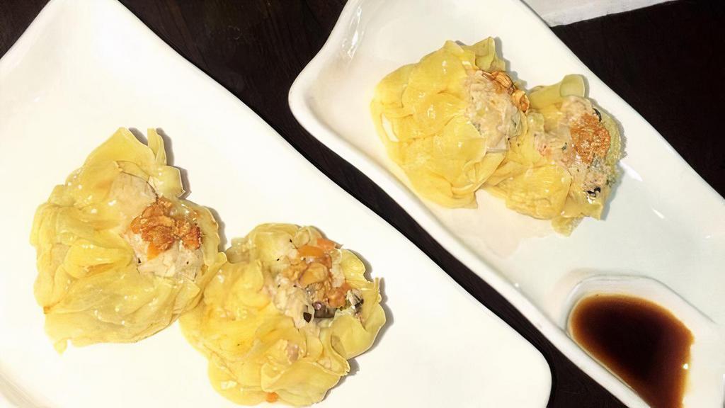 Chicken Dumpling (Steamed Or Fried) · Minced chicken & shrimp, mushroom w/ ginger soy dip.
