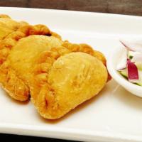 Curry Puff · Chicken, potatoes, onion and curry powder.