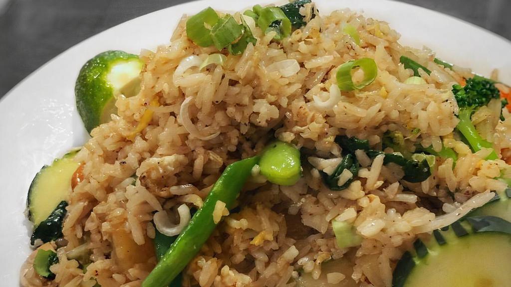 Pineapple Fried Rice · W/ egg, onions, scallions, pineapple, carrots, raisin and cashew nuts.
