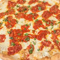 Margherita Pie · Fresh mozzarella cheese, fresh basil, and homemade tomato sauce.