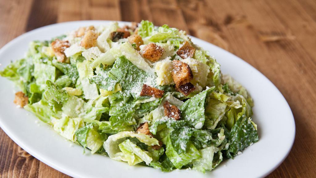 Classic Caesar Salad · Romaine heart, house made dressing, Pecorino and croutons.