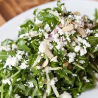 Baby Arugula · Granny Smith apple, toasted almonds, red onion, goat cheese and roasted lemon vinaigrette.