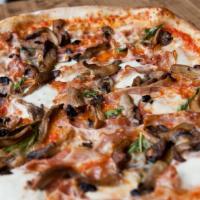 The Lexington Pizza · Smoked pancetta, tomato sauce, fresh mozzarella, black garlic, seared oyster mushrooms, basi...