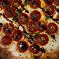 Sweet Fatty Pizza · Ricotta, pepperoni, chili fakes, oregano, fresh garlic, vincotto and honey.
