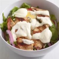 Cobb Salad · Grilled chicken breast served over a bed of mixed greens with avocado, tomatoes, red onions,...