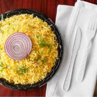 Vegetarian Biryani · Basmati rice cooked with mixed vegetable and blend of herbs.