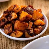 Home Fries · Yukon gold potatoes cooked with the skin in oil, with green and red bell peppers, onion and ...