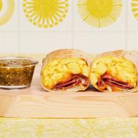 Turkey Bacon Breakfast Burrito · Two scrambled eggs, crispy turkey bacon, hash browns, and melted cheese wrapped in a fresh f...