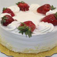 Strawberry Shortcake · Yellow Cake w/ Strawberry Filling and Whipped Cream Icing w/ Fresh Strawberries on top.