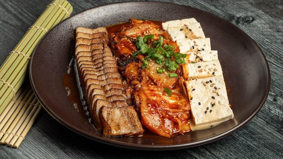 Tofu Kimchi Bossam · Braised pork belly with sauteed kimchi and tofu.