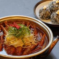 Braised Spicy Chicken Feet / 국물 닭발 · Served with rice ball.