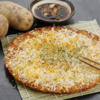 Potato Pancake / 눈꽃 감자전 · Korean savory pancake made with grated potatoes topped with fresh snowing cheese.