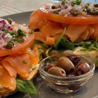 New York Lox & Bagel  · Nova Scotia smoked salmon on a toasted open- faced everything bagel with cream cheese, tomat...