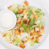 Caesar Salad · Romaine lettuce, homemade croutons, Parmesan cheese, caesar dressing.