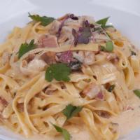 1/2 Spaghetti Carbonara Pasta · Diced onions, prosciutto, cream sauce.