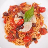 Spaghetti Puttanesca · Plum tomatoes, gaeta olives, anchovies, evoo, with light garlic and capers.