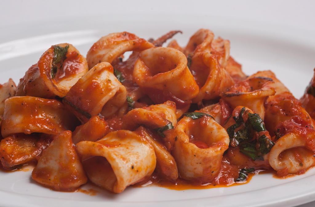Calamari Marinara Entree · Served with clams and mussels over linguine marinara or fra diavolo style. No salad