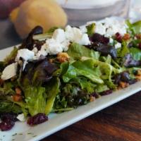 Sun-Dried Cranberry · Baby mixed greens sun-dried cranberries, candied walnuts, goat cheese with our raspberry vin...