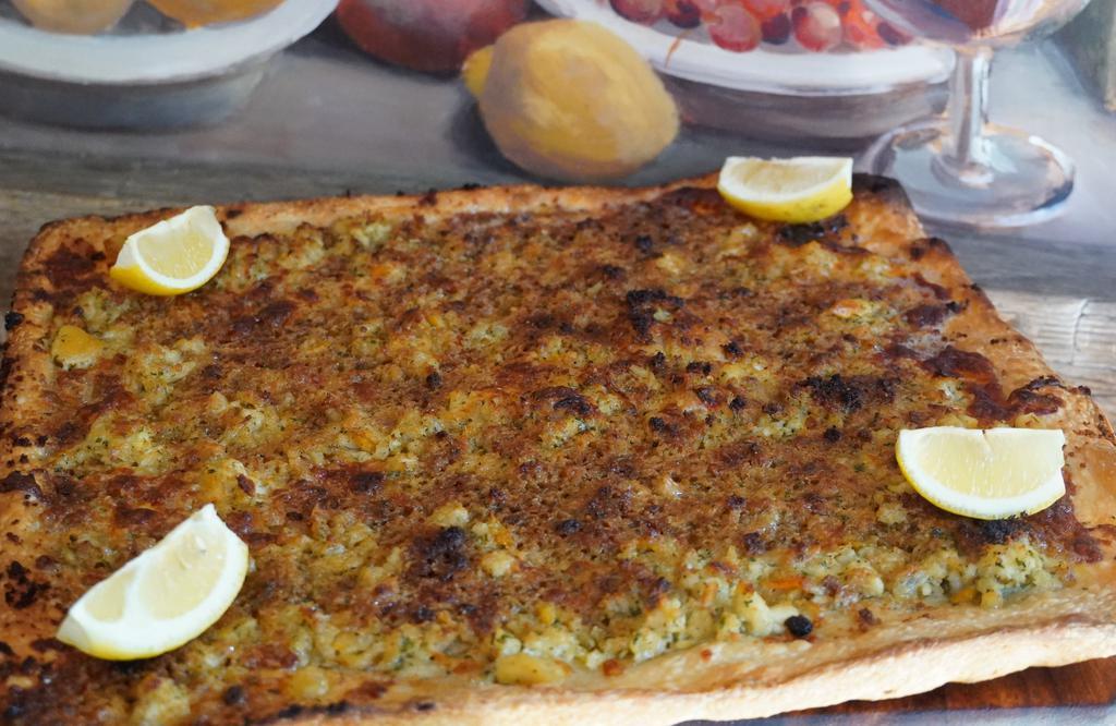 Clam Oreganata  · Chopped clams ,EVO  garlic topped with season bread crumbs  mozzarella