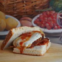 Chicken Parmigiana · Chicken cutlet topped with marinara and melted mozzarella