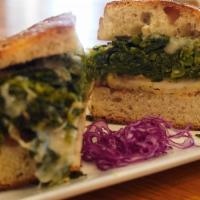 Chicken Cutlet Broccoli Rabe W/Melted Provolone · Chicken cutlet topped with sautéed broccoli rabe and melted provolone